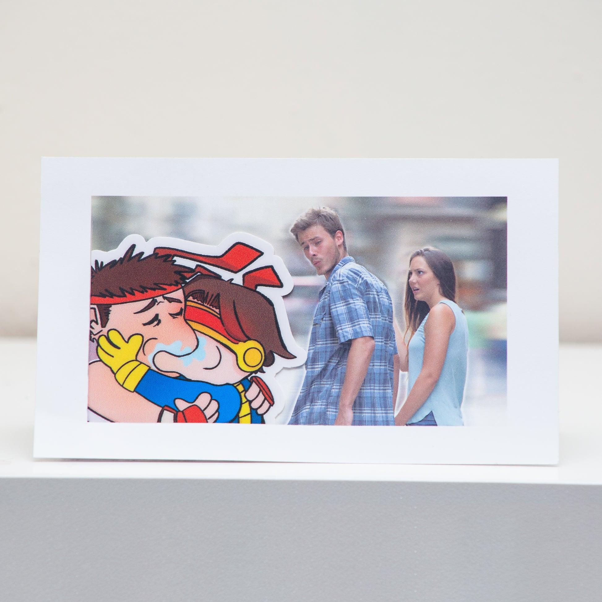 Distracted Boyfriend Meme Postcard Display.