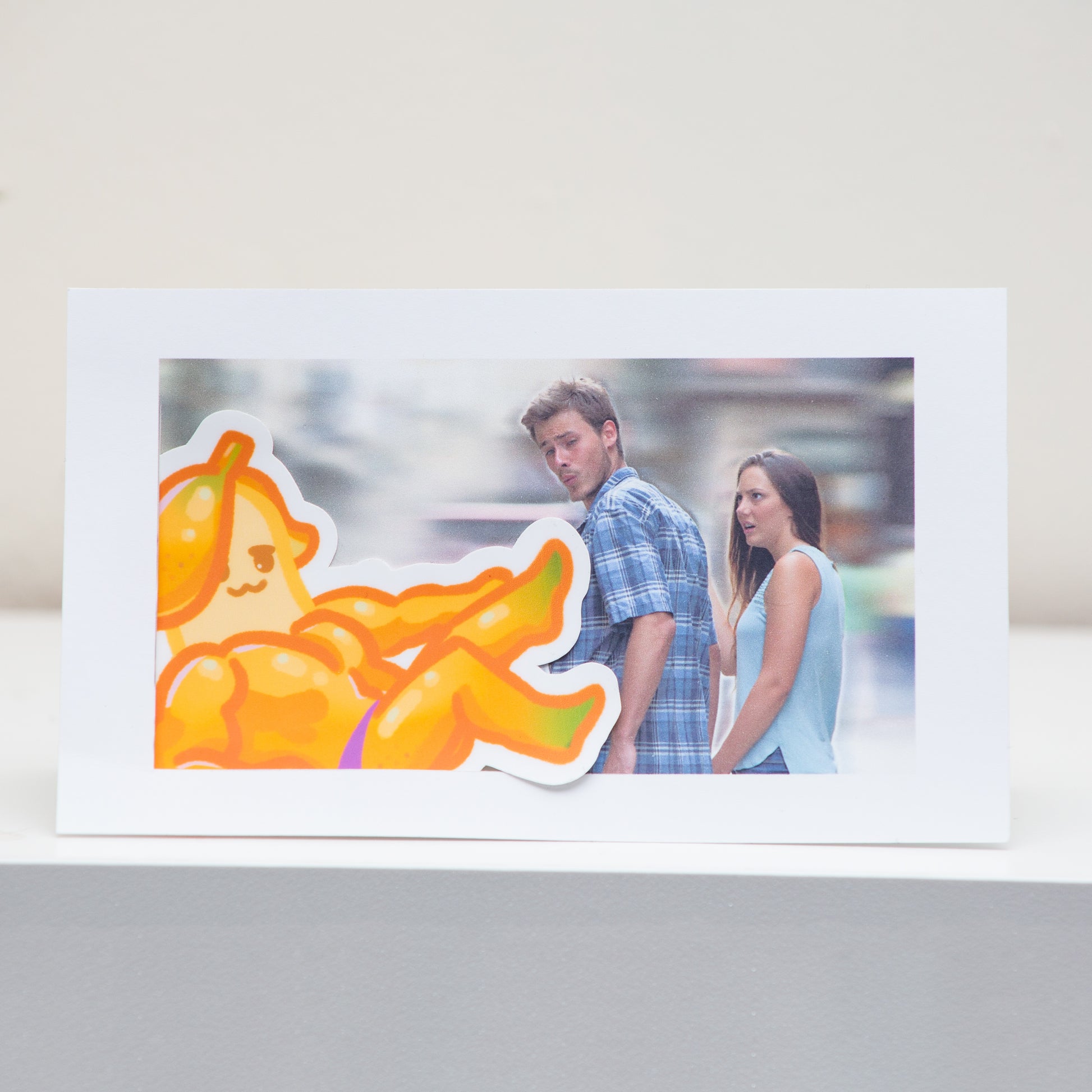Distracted Boyfriend Meme Postcard Display.