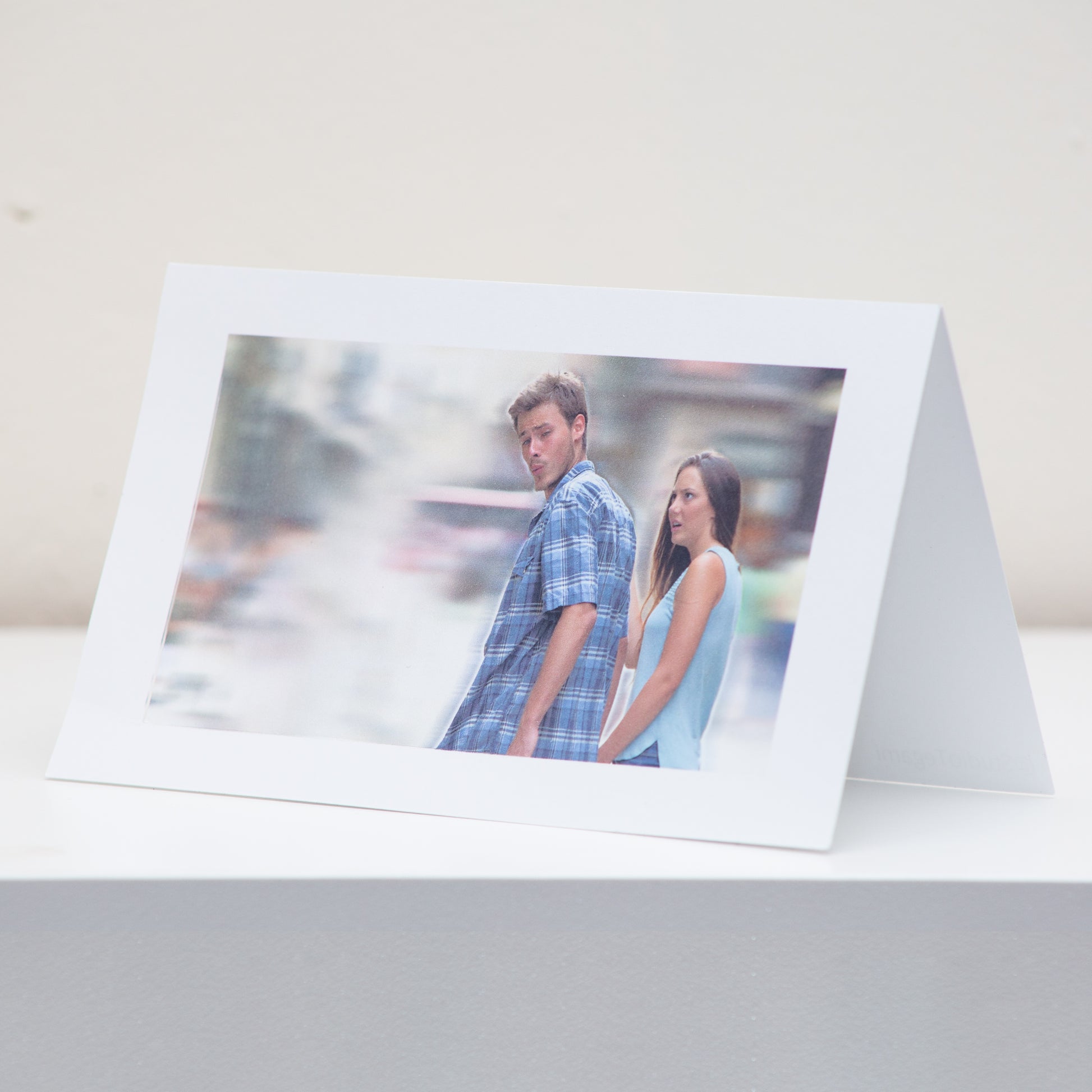 Distracted Boyfriend Meme Postcard Display.