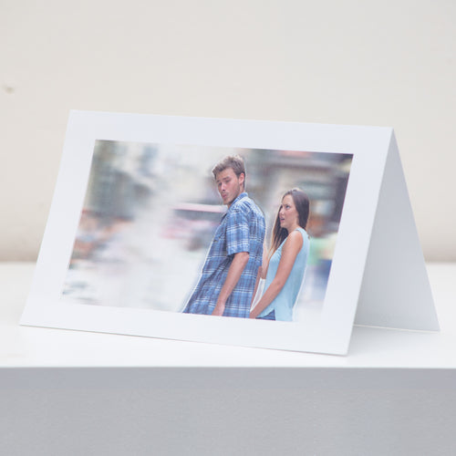 Distracted Boyfriend Meme Postcard Display.
